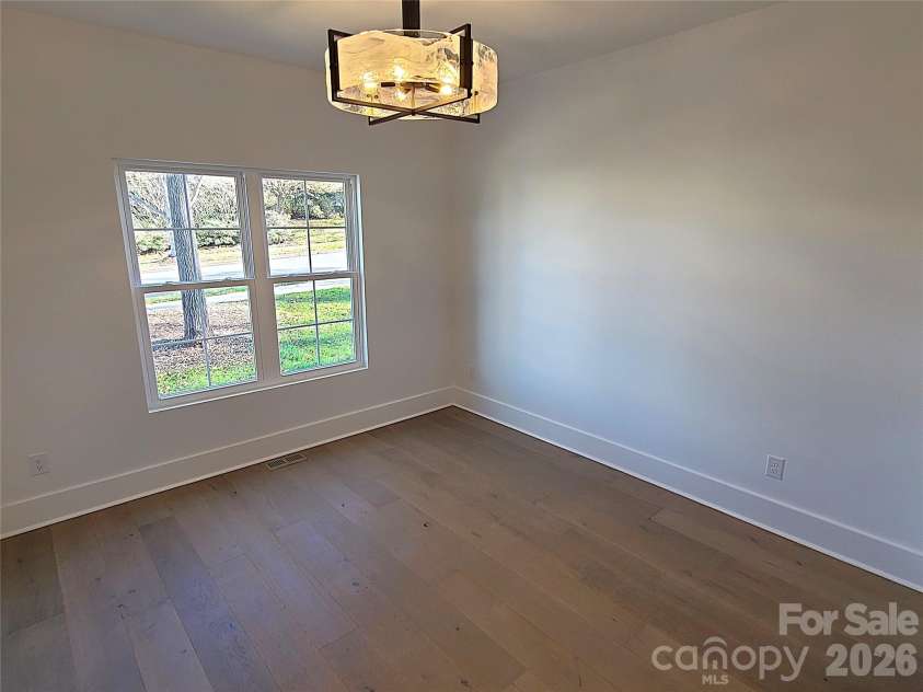 405 19th Avenue Circle, Hickory, NC 28601.  MLS# CAR4390265, YatesRealty ID 338. Main-level bedroom