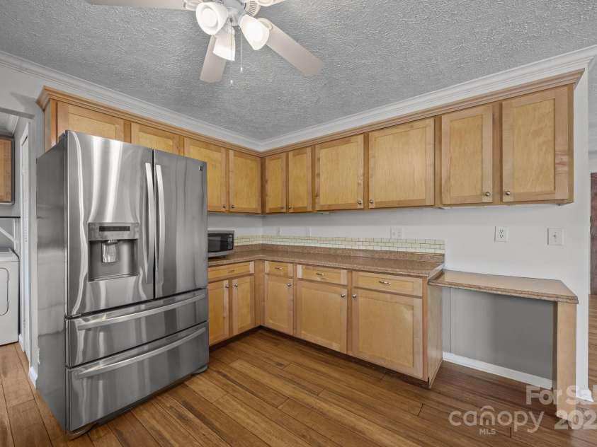 382 Onteora Boulevard, Asheville, NC 28803.  MLS# CAR4272620, YatesRealty ID 3380. Kitchen behind the Living Room