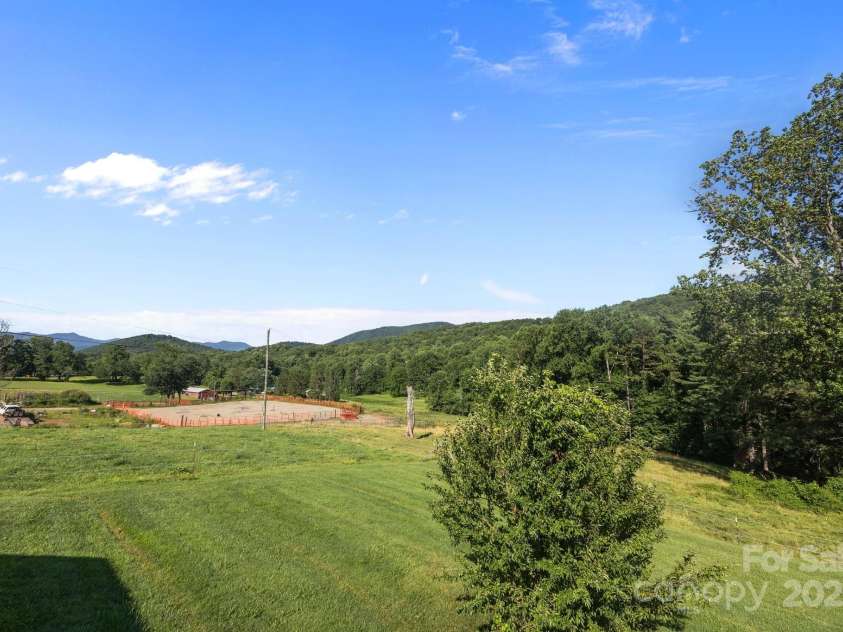 382 Onteora Boulevard, Asheville, NC 28803.  MLS# CAR4272620, YatesRealty ID 3380. Watch the down the street neighbors while drassage is going on. Check out the mountain view as well.