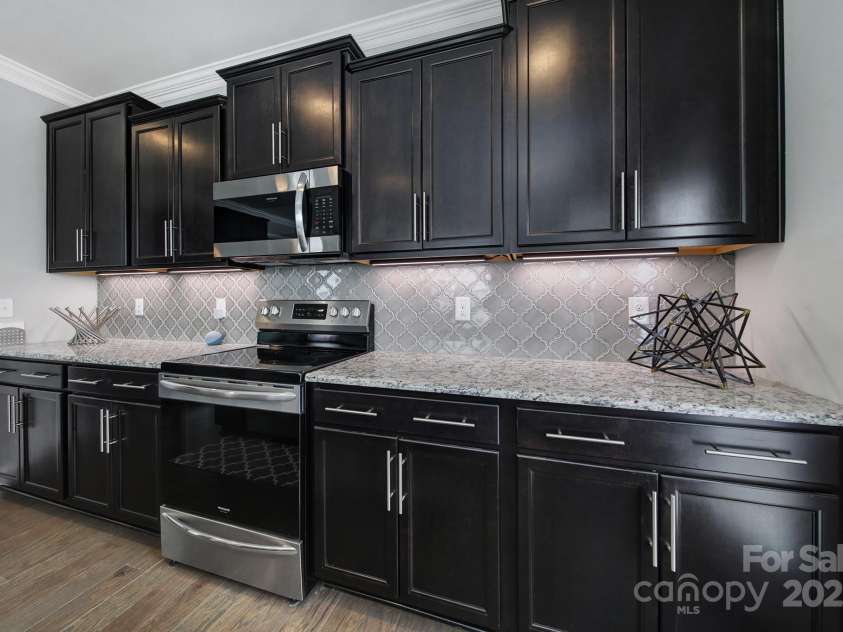 8702 Aspinwall Drive, Charlotte, NC 28216.  MLS# CAR4272484, YatesRealty ID 33800. 