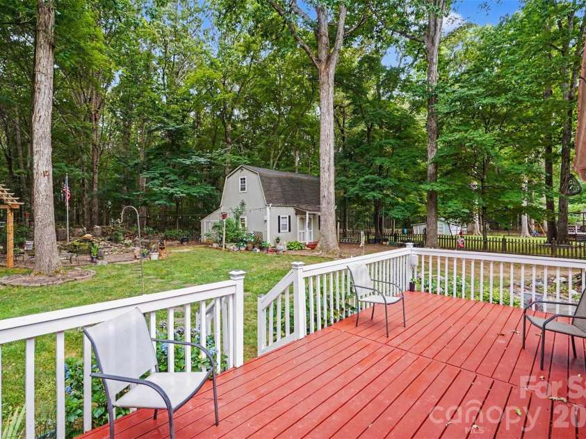 6007 Charlton Oaks Drive, Waxhaw, NC 28173.  MLS# CAR4395428, YatesRealty ID 33803. Back deck