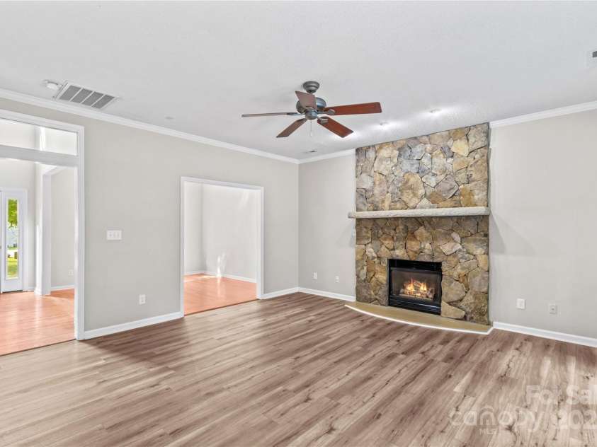145 Summerbrook Lane, Mooresville, NC 28117.  MLS# CAR4280229, YatesRealty ID 33808. Great Room features a Fireplace and ceiling fan