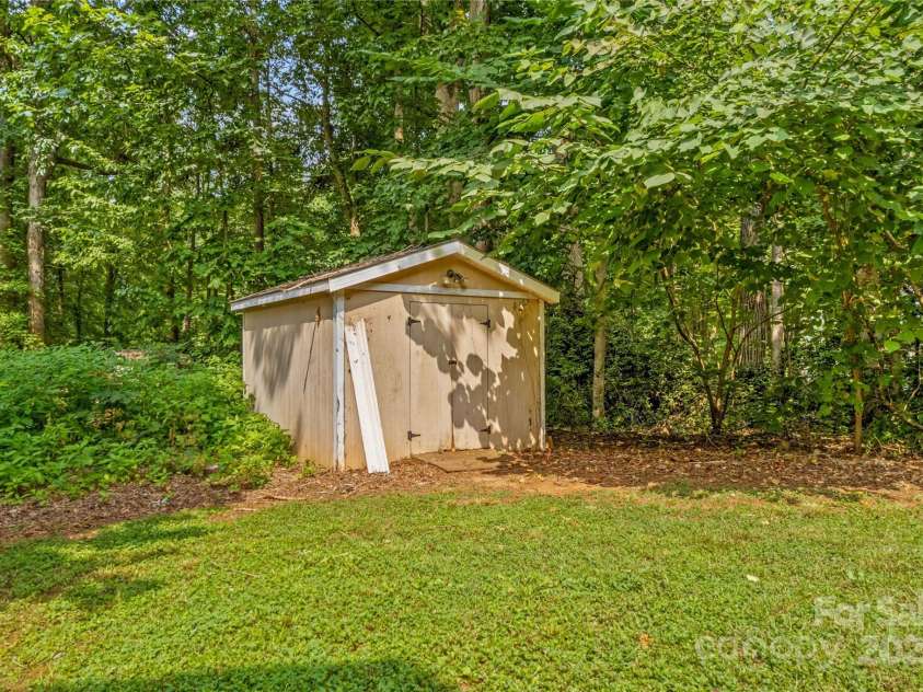 145 Summerbrook Lane, Mooresville, NC 28117.  MLS# CAR4280229, YatesRealty ID 33808. Storage Building