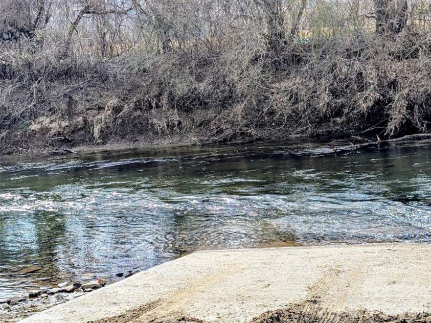 979 Greenville Highway, Brevard, NC 28712.  MLS# CAR4338067, YatesRealty ID 33808. Concrete boat ramp makes access easy.