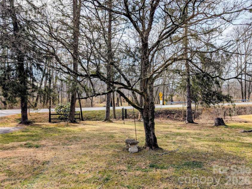 979 Greenville Highway, Brevard, NC 28712.  MLS# CAR4338067, YatesRealty ID 33808. Front yard view from front door.