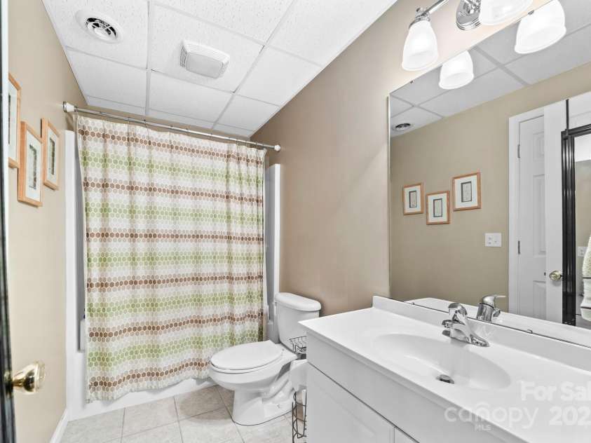 221 Deerfield Drive, Mount Holly, NC 28120.  MLS# CAR4280718, YatesRealty ID 33809. Full bath in basement.