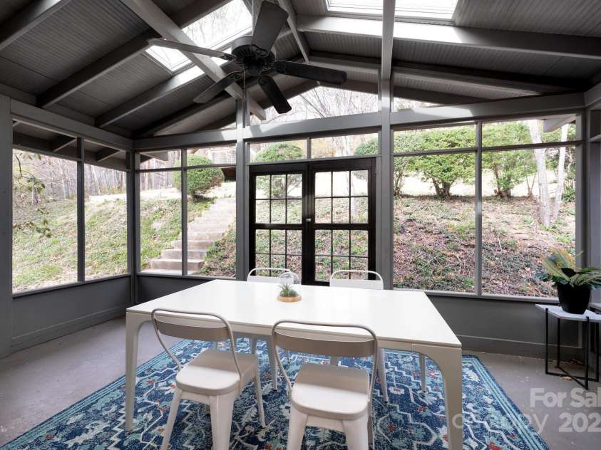 145 Stratford Road, Asheville, NC 28804.  MLS# CAR4239165, YatesRealty ID 3381. Lovely Screened-In Porch off the Kitchen