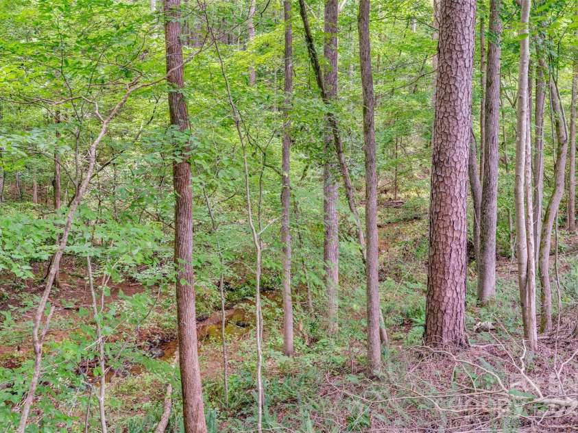 10351 Fink Road, Mount Pleasant, NC 28124.  MLS# CAR4280844, YatesRealty ID 33810. Creek