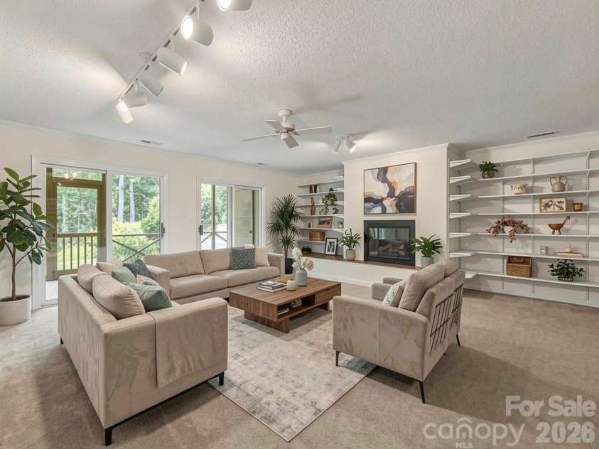 12 Hunting Country Trail, Tryon, NC 28782.  MLS# CAR4394832, YatesRealty ID 33813. Virtually Staged