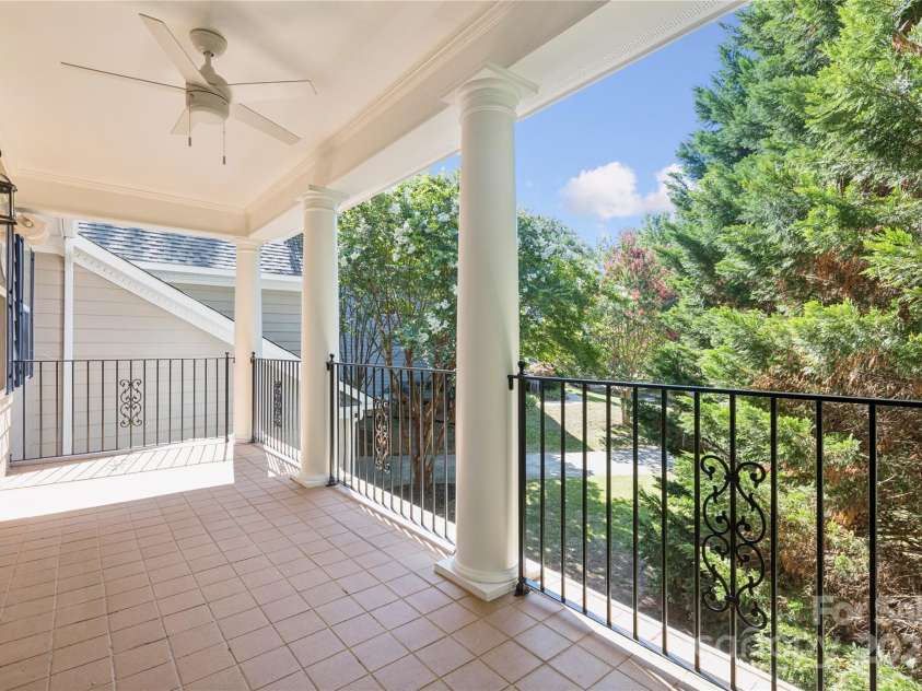 1627 Scotch Pine Lane, Tega Cay, SC 29708.  MLS# CAR4281753, YatesRealty ID 33813. Balcony porch with ceiling fan