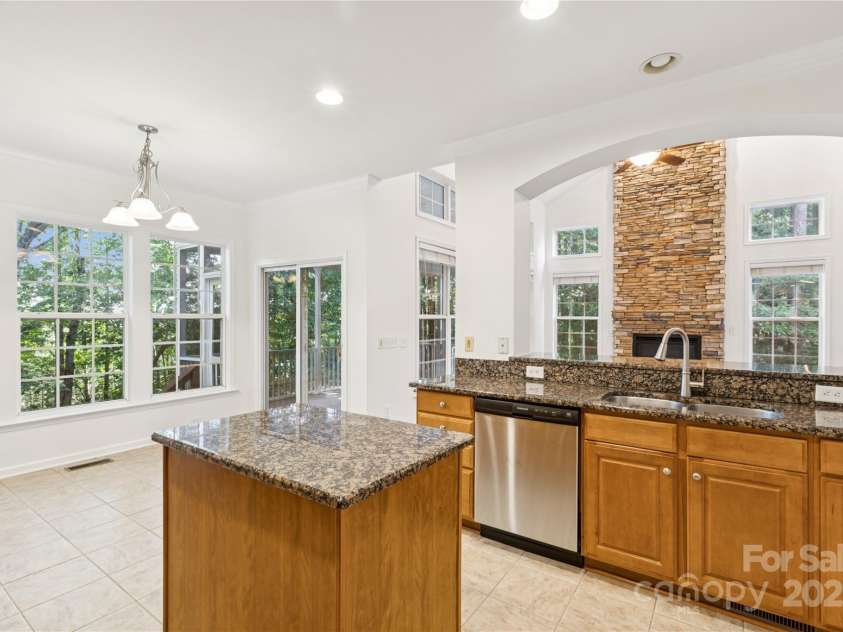 1627 Scotch Pine Lane, Tega Cay, SC 29708.  MLS# CAR4281753, YatesRealty ID 33813. Center island with granite counters
