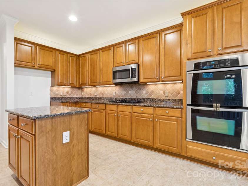 1627 Scotch Pine Lane, Tega Cay, SC 29708.  MLS# CAR4281753, YatesRealty ID 33813. Double ovens to make holidays a breeze!