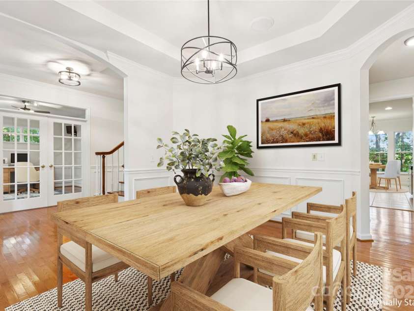 1627 Scotch Pine Lane, Tega Cay, SC 29708.  MLS# CAR4281753, YatesRealty ID 33813. Elegant Dining Room with Tray Ceiling