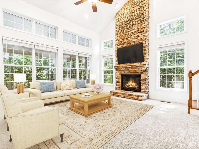 1627 Scotch Pine Lane, Tega Cay, SC 29708.  MLS# CAR4281753, YatesRealty ID 33813. Great Room featuring stone fireplace