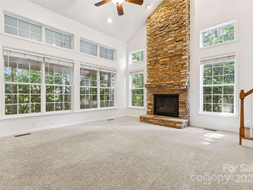 1627 Scotch Pine Lane, Tega Cay, SC 29708.  MLS# CAR4281753, YatesRealty ID 33813. Scenic views of the wooded back