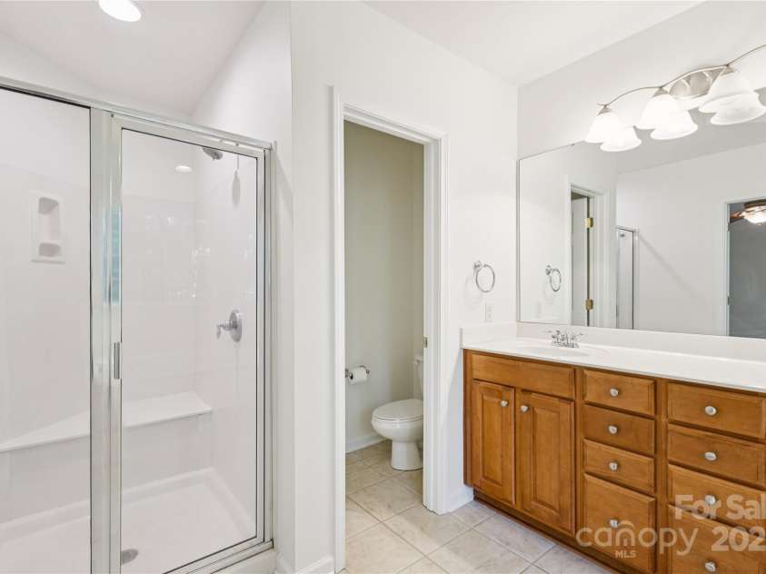 1627 Scotch Pine Lane, Tega Cay, SC 29708.  MLS# CAR4281753, YatesRealty ID 33813. Shower & separate water closet in full bath