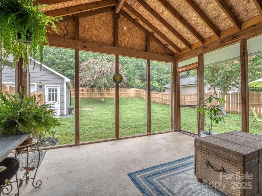 8715 Parkchester Drive, Charlotte, NC 28277.  MLS# CAR4288901, YatesRealty ID 33815. Large Screened Porch Overlooking Your Private Rear Yard