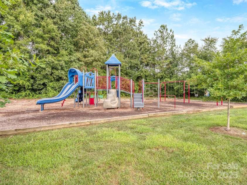 8715 Parkchester Drive, Charlotte, NC 28277.  MLS# CAR4288901, YatesRealty ID 33815. Raeburn Community Playground