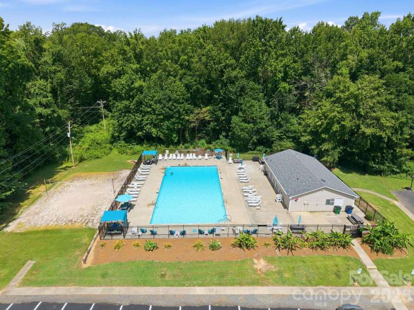 8048 Hunley Ridge Road, Matthews, NC 28104.  MLS# CAR4395882, YatesRealty ID 33821. Community pool