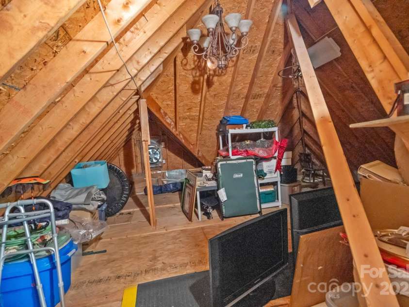 17018 Laurelmont Court, Fort Mill, SC 29707.  MLS# CAR4278414, YatesRealty ID 33822. Floored attic space off of bedroom #3