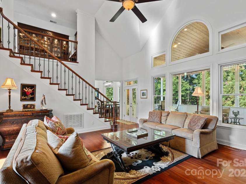 17018 Laurelmont Court, Fort Mill, SC 29707.  MLS# CAR4278414, YatesRealty ID 33822. Great room overlooking screened porch