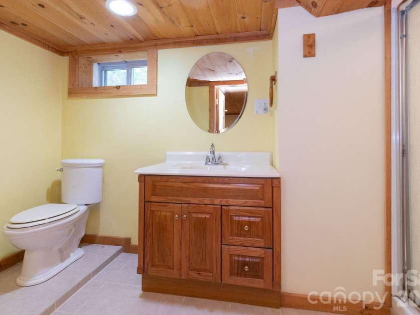 107 Cabin Fever Trail, Maggie Valley, NC 28751.  MLS# CAR4288888, YatesRealty ID 33824. Basement Bathroom