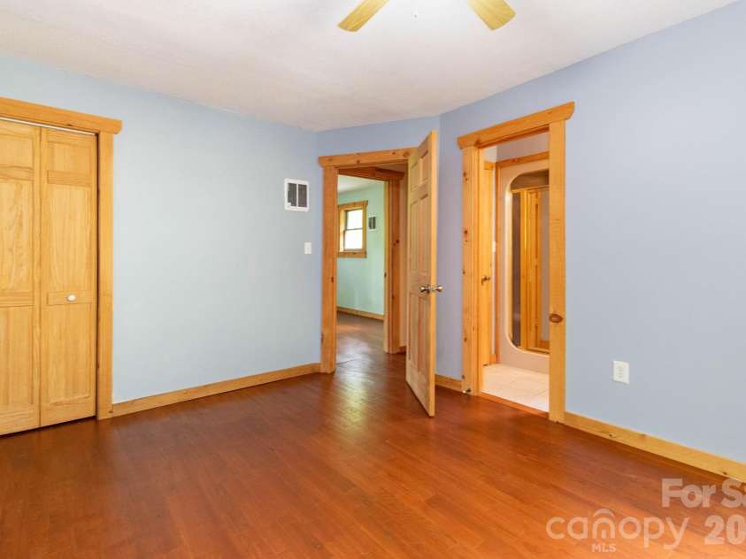 107 Cabin Fever Trail, Maggie Valley, NC 28751.  MLS# CAR4288888, YatesRealty ID 33824. Bedroom 1 - direct bathroom access