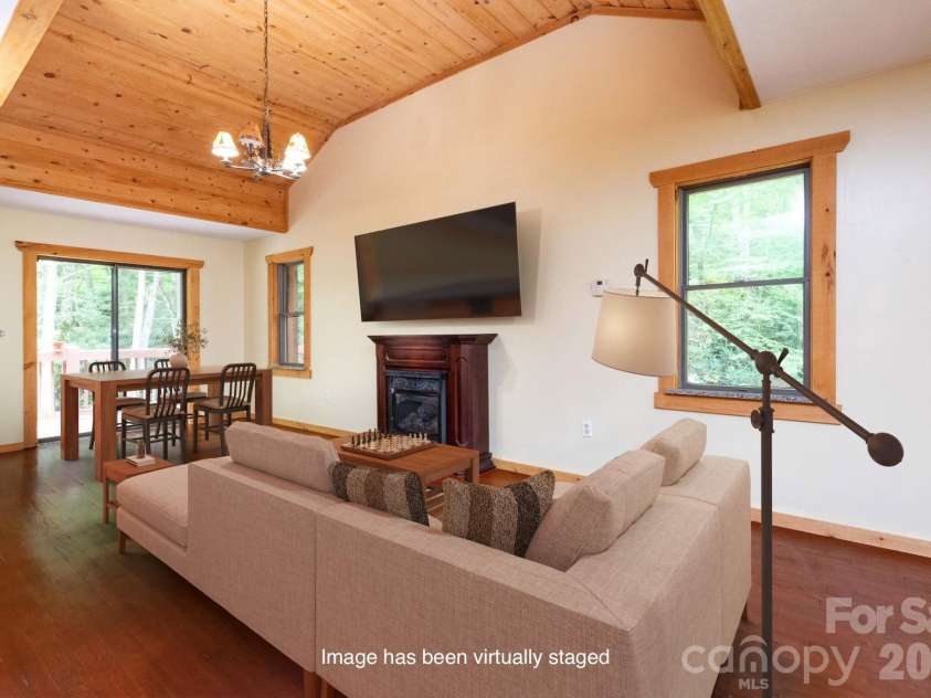 107 Cabin Fever Trail, Maggie Valley, NC 28751.  MLS# CAR4288888, YatesRealty ID 33824. Living/Dining Area - Virtually Staged