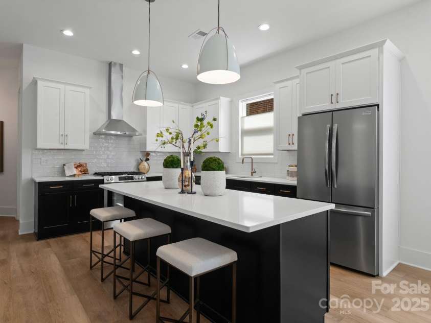 2006 St John Street, Charlotte, NC 28216.  MLS# CAR4255545, YatesRealty ID 33830. 