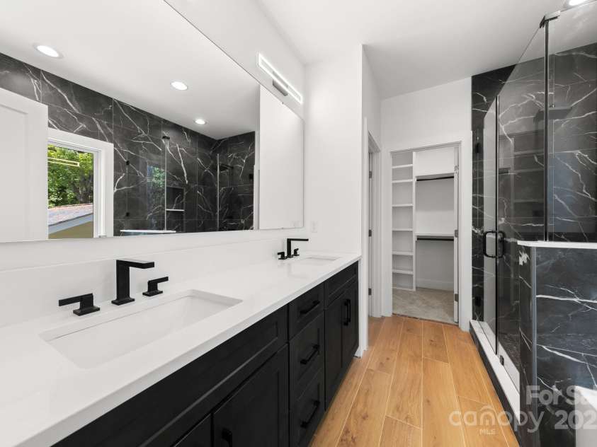 2006 St John Street, Charlotte, NC 28216.  MLS# CAR4255545, YatesRealty ID 33830. Dual Vanity Sinks 