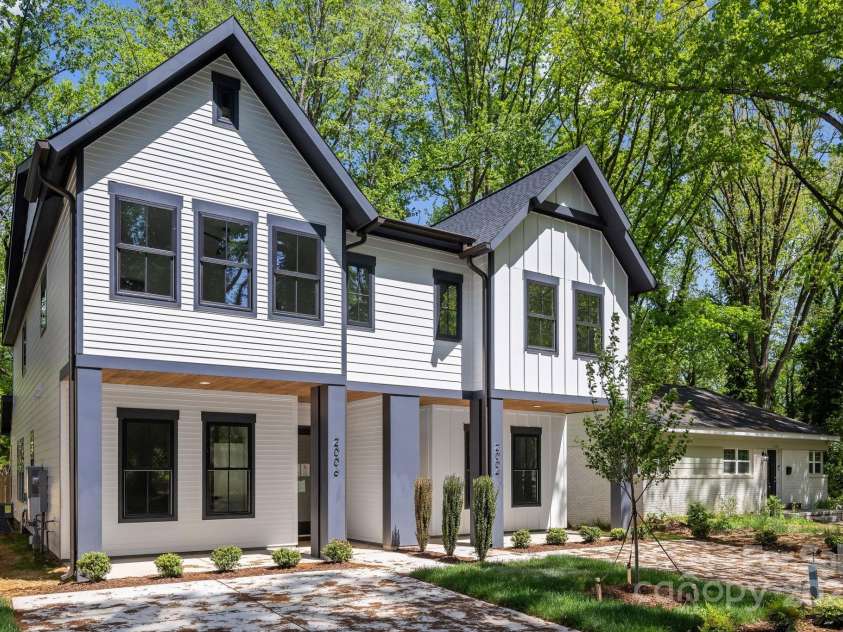 2006 St John Street, Charlotte, NC 28216.  MLS# CAR4255545, YatesRealty ID 33830. Exterior White Units 
