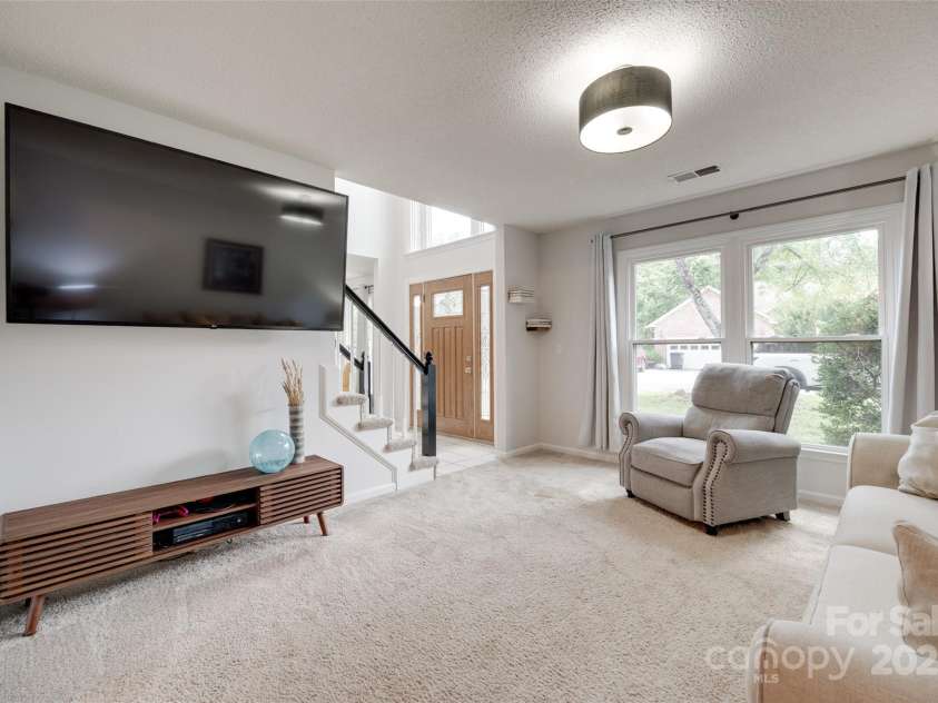 12004 Woodholm Court, Tega Cay, SC 29708.  MLS# CAR4272763, YatesRealty ID 33834. Living room