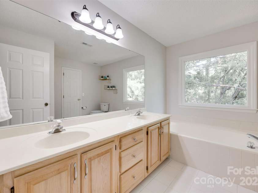 12004 Woodholm Court, Tega Cay, SC 29708.  MLS# CAR4272763, YatesRealty ID 33834. Primary bath