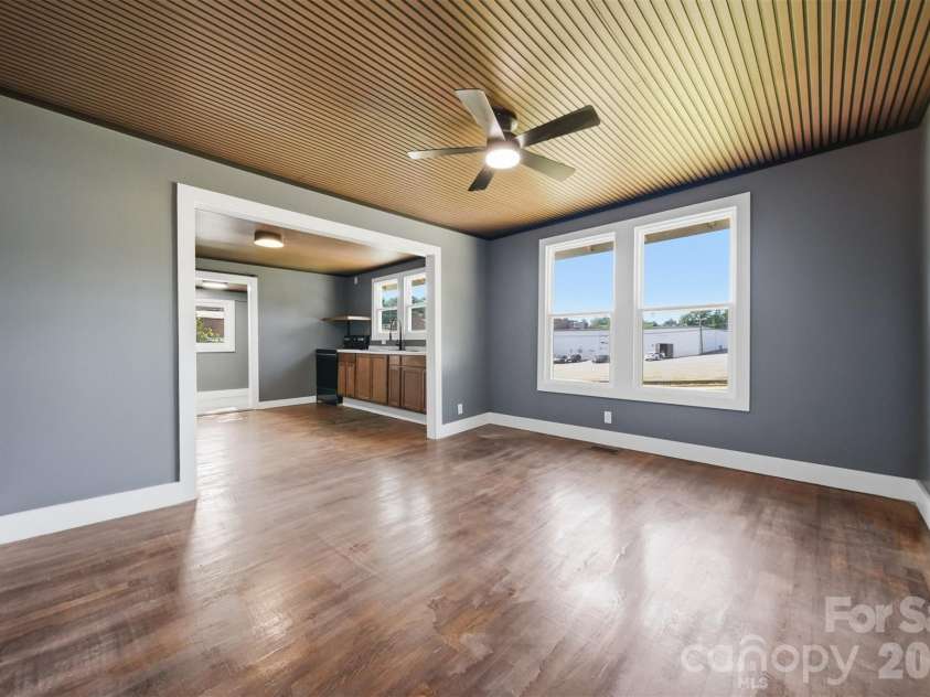 718 11th Street Place, Hickory, NC 28601.  MLS# CAR4397493, YatesRealty ID 33834. Dining room looking towards the kitchen.