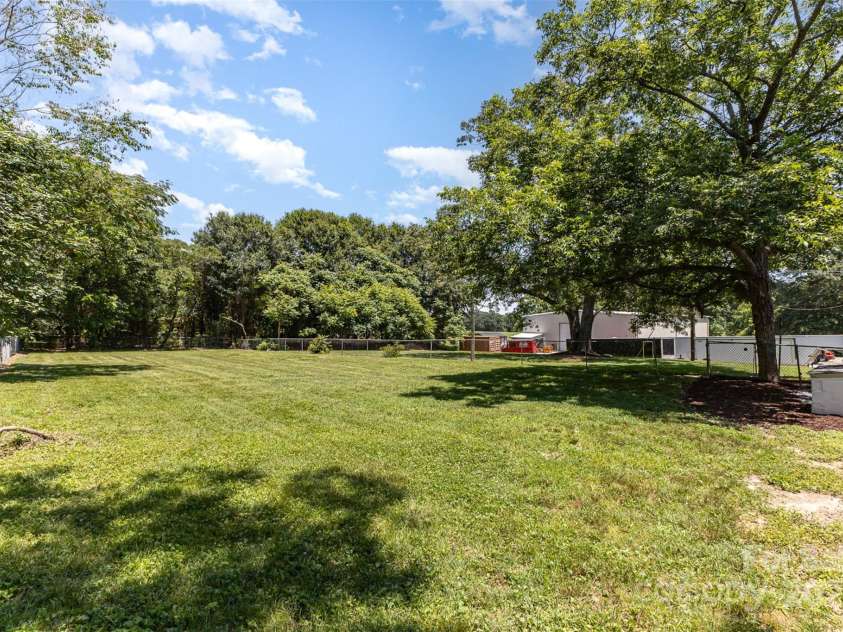 309 Main Street, Lattimore, NC 28089.  MLS# CAR4273579, YatesRealty ID 33835. Back yard