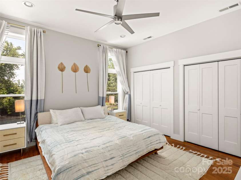 9 Pennsylvania Avenue, Asheville, NC 28806.  MLS# CAR4270881, YatesRealty ID 33836. Open and airy primary bedroom on the upper level with double closets.