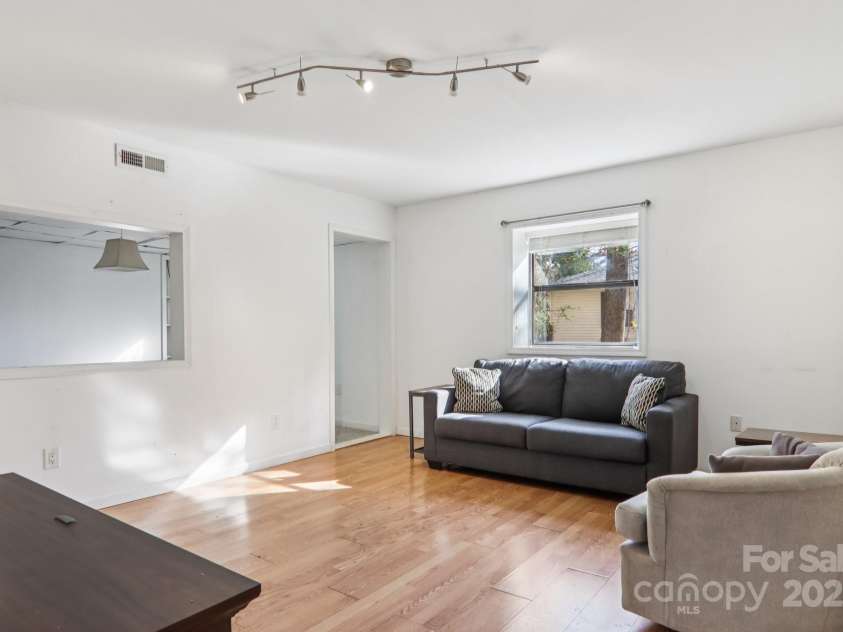 224 Beverly Road, Asheville, NC 28805.  MLS# CAR4278011, YatesRealty ID 33837. Lower Den