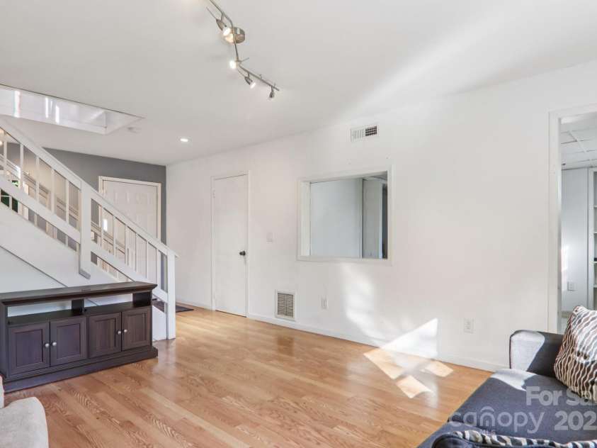 224 Beverly Road, Asheville, NC 28805.  MLS# CAR4278011, YatesRealty ID 33837. Lower Den Media/Gamer Room