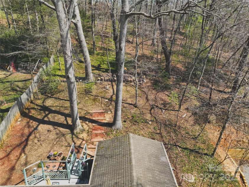224 Beverly Road, Asheville, NC 28805.  MLS# CAR4278011, YatesRealty ID 33837. Private Natural Backyard