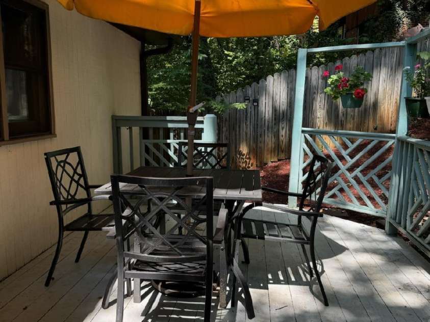224 Beverly Road, Asheville, NC 28805.  MLS# CAR4278011, YatesRealty ID 33837. Summer time on the Deck
