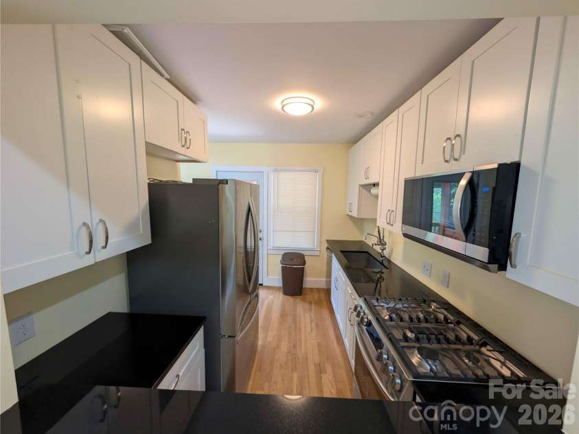 542 Stegall Street, Charlotte, NC 28217.  MLS# CAR4398380, YatesRealty ID 33847. Kitchen bar view