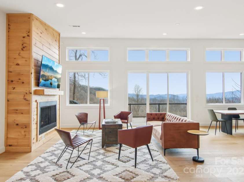 584 Walnut Cove Ridge, Bryson City, NC 28713.  MLS# CAR4232880, YatesRealty ID 3385. Cozy up to the fireplace with views of the mountains!