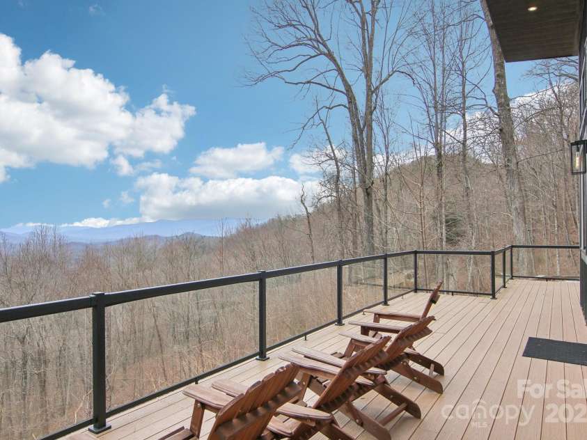 584 Walnut Cove Ridge, Bryson City, NC 28713.  MLS# CAR4232880, YatesRealty ID 3385. Front deck with long range views