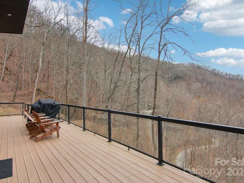 584 Walnut Cove Ridge, Bryson City, NC 28713.  MLS# CAR4232880, YatesRealty ID 3385. Front Deck with Long Range Views
