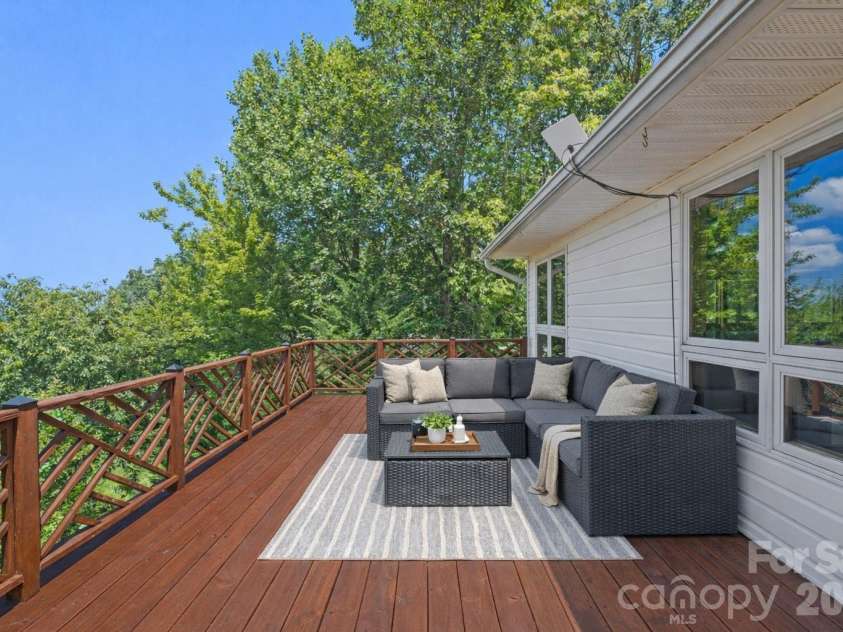 5545 Pine Ridge Drive, Connelly Springs, NC 28612.  MLS# CAR4344436, YatesRealty ID 33850. Large Upper Deck w/ Year-Round Long-Range Mountain Views *Photo has been virtually enhanced.*