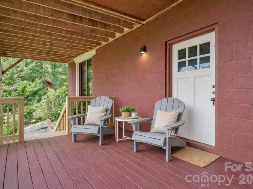 5545 Pine Ridge Drive, Connelly Springs, NC 28612.  MLS# CAR4344436, YatesRealty ID 33850. Lower Deck w/ Year-Round Long-Range Mountain Views*Photo has been virtually enhanced.*