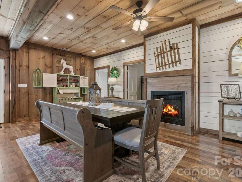 615 Don Felmet Road, Marshall, NC 28753.  MLS# CAR4391093, YatesRealty ID 33852. Dining area w/gas fireplace