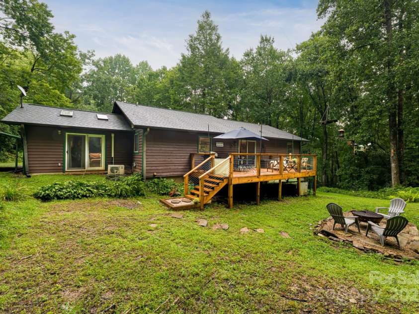 19 Forge Drive, Mills River, NC 28759.  MLS# CAR4289145, YatesRealty ID 33856. Exterior Stairs Connect Deck with Back Yard