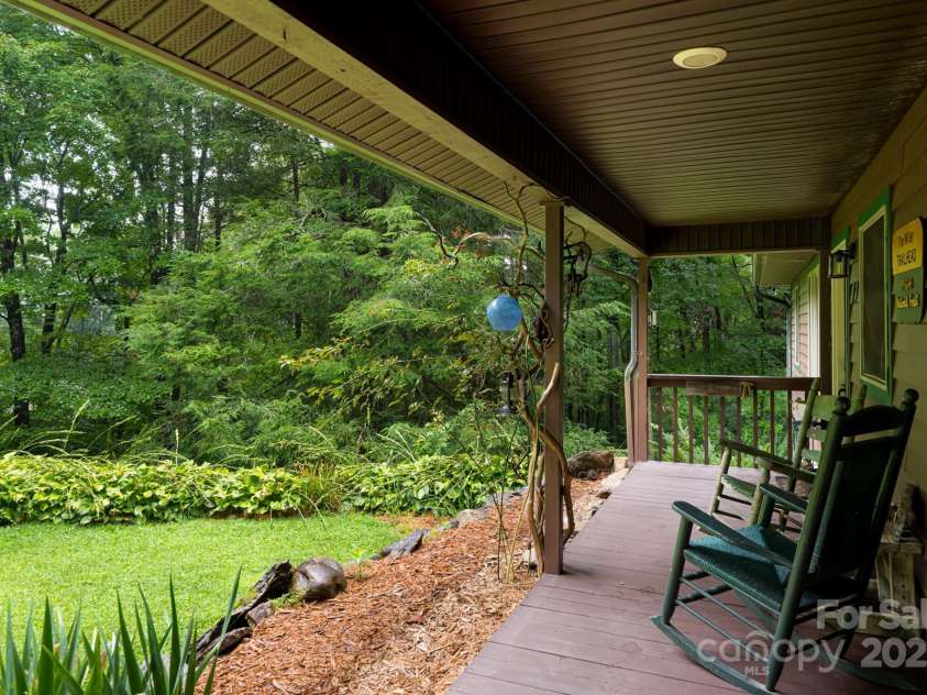 19 Forge Drive, Mills River, NC 28759.  MLS# CAR4289145, YatesRealty ID 33856. Front Porch Overlooks Well-Maintained Yard