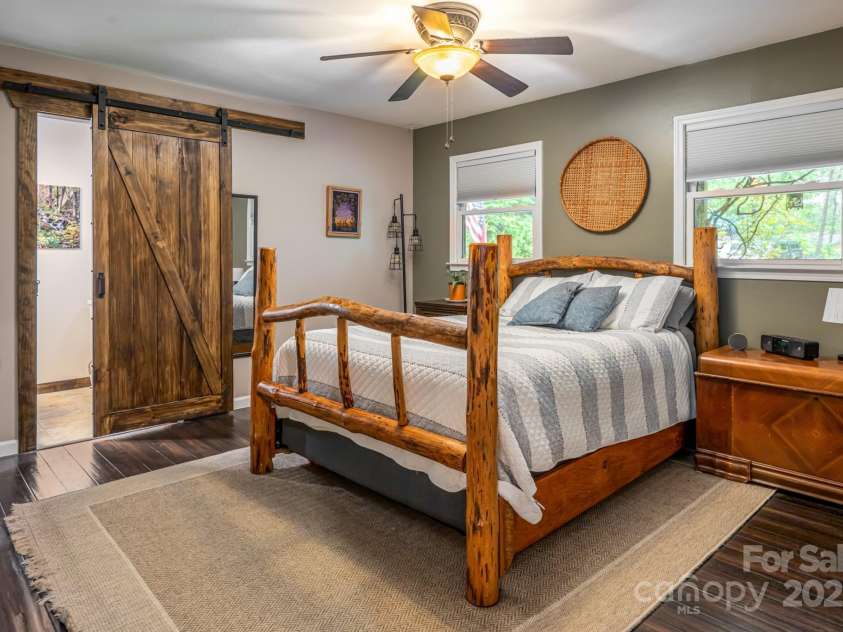 19 Forge Drive, Mills River, NC 28759.  MLS# CAR4289145, YatesRealty ID 33856. Primary Suite Features a Sliding Barn Door